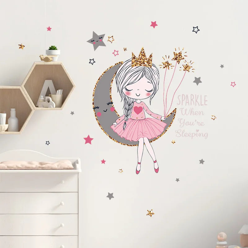 Wall decal of a fairy with a moon and stars on a wall in a child's room.
