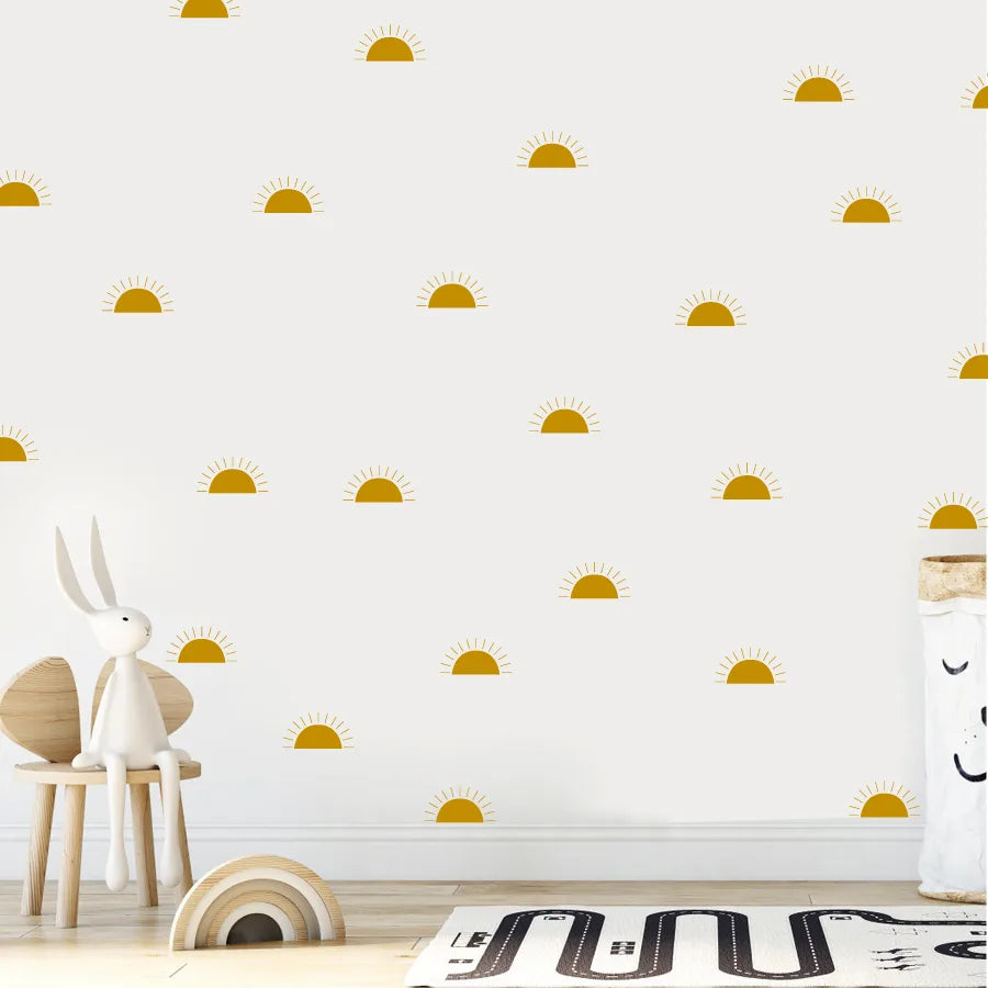 Wall with Tipi Tipi Tap Boho Mini Half Sun wall stickers, white rabbit figurine, and wooden toys on a light wood floor.