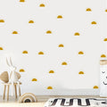 Wall with Tipi Tipi Tap Boho Mini Half Sun wall stickers, white rabbit figurine, and wooden toys on a light wood floor.