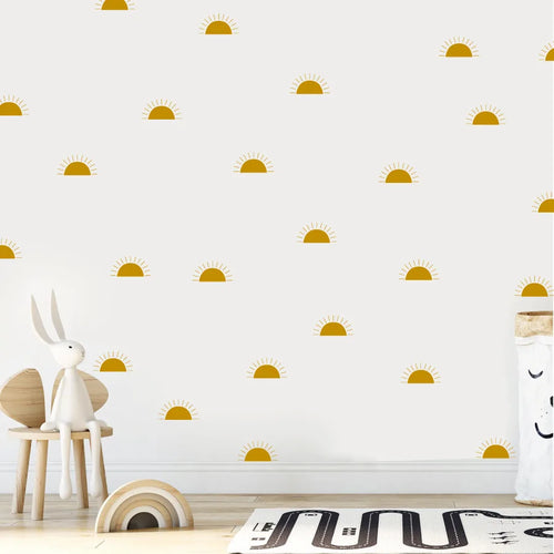 Wall with Tipi Tipi Tap Boho Mini Half Sun wall stickers, white rabbit figurine, and wooden toys on a light wood floor.