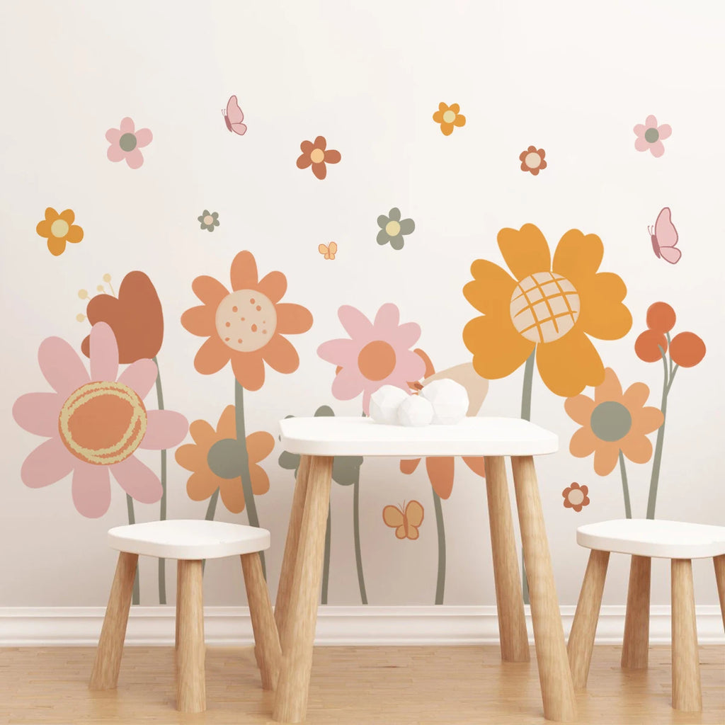 Children's table and chairs with Tipi Tipi Tap Boho Retro Colorful Flower Wall Decals on a light pink wall.