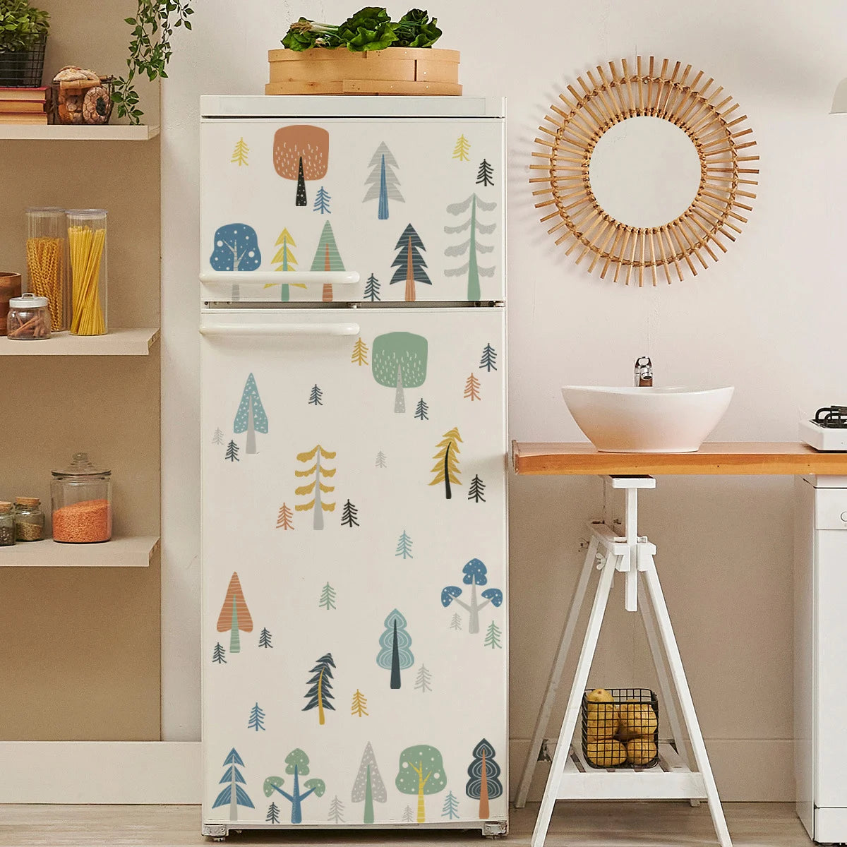 Kitchen with a refrigerator featuring tree pattern, wooden shelf, and round mirror.
