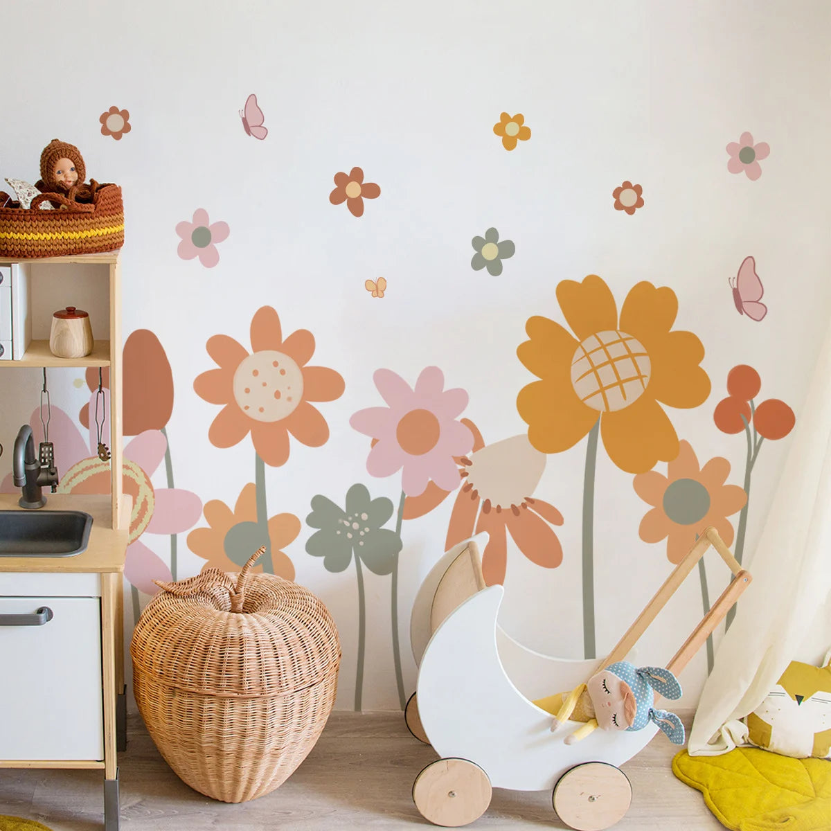 Children's room with Tipi Tipi Tap Boho Retro Colorful Flower wall sticker, toys, and a wicker basket.
