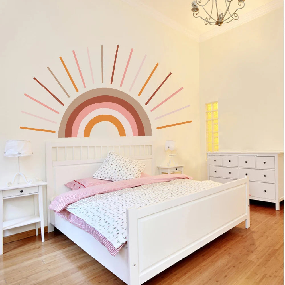 Kid's room with a This Tipi Tipi Tap Boho Sunshine Bliss Half Sun wall sticker, bed, and cupboard.