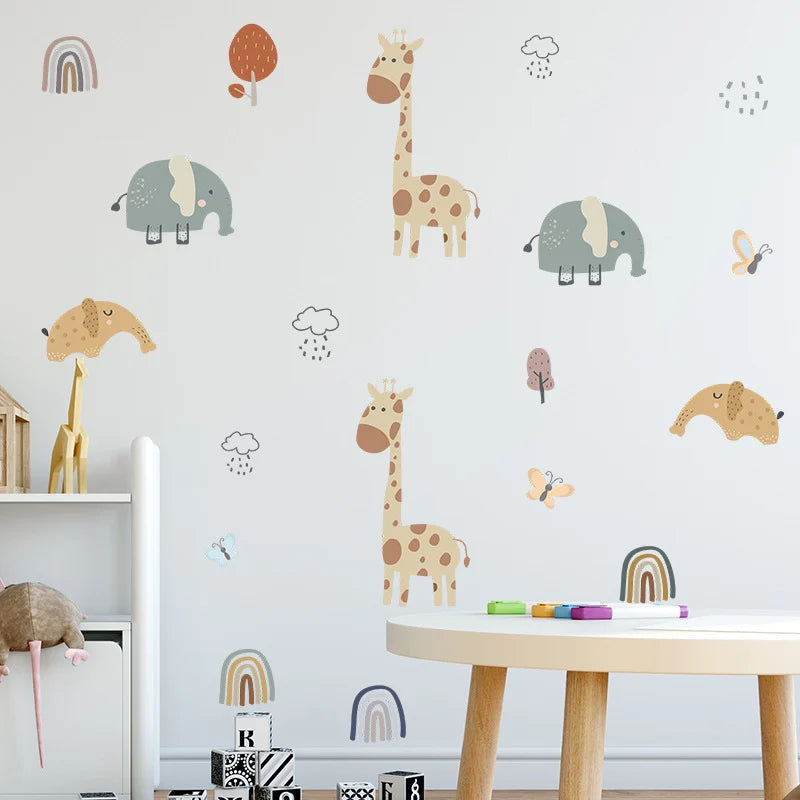 Children's room with animal wall stickers on a light gray wall.