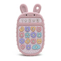 Pink Tipi Tipi Tap bunny calculator silicone teether toy with colorful number buttons on a white background