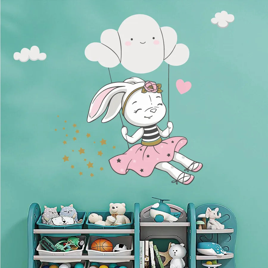 Children's room with a Tipi Tipi Tap Cute Bunny Swing On Cloud wall decal of a girl on a teal wall.