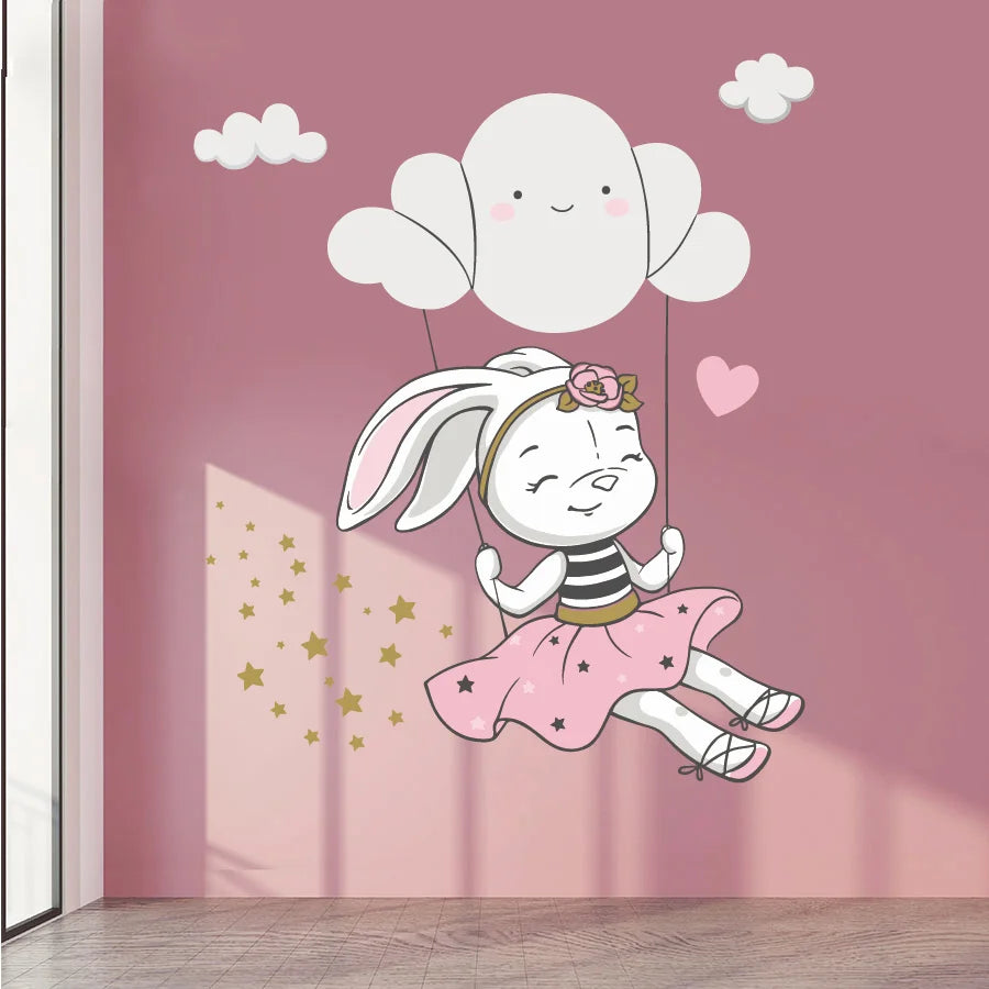 Tipi Tipi Tap Cute Bunny Swing On Cloud wall decal on a pink wall.