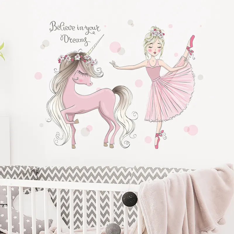 Tipi Tipi Tap wall decal of a pink unicorn and ballerina with 'Believe in your dreams' text in a nursery setting.