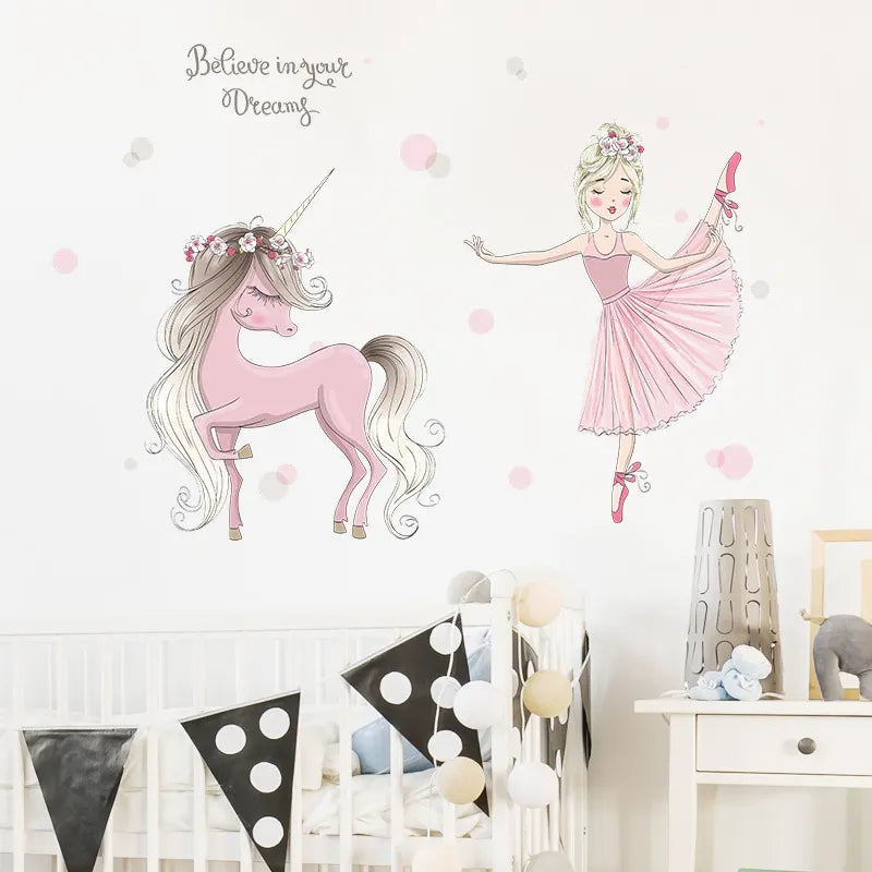 Children's room with Tipi Tipi Tap Girl Dancing with Unicorn wall decals, white crib, and decorative elements.