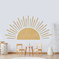 Tipi Tipi Tap sunburst half sun wall decal in a room with wooden chairs and a small table.