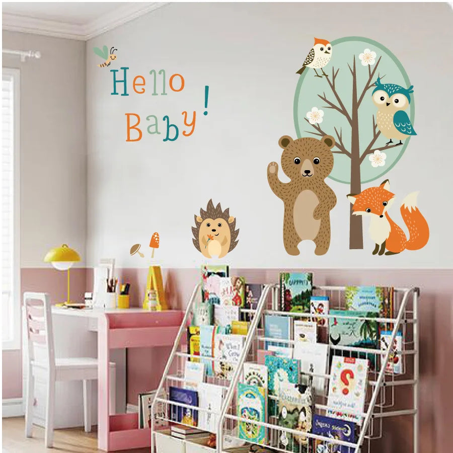 Children's room with Tipi Tipi Tap "Hello Baby" Jungle Animal Wall Decals comprising a bear, fox, and hedgehog, and 'Hello Baby!' text.