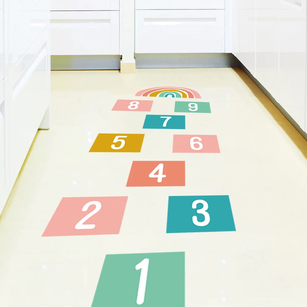 Colorful hopscotch grid with numbers on a white floor.