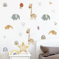 Children's room with animal-themed wall decals on a white wall.