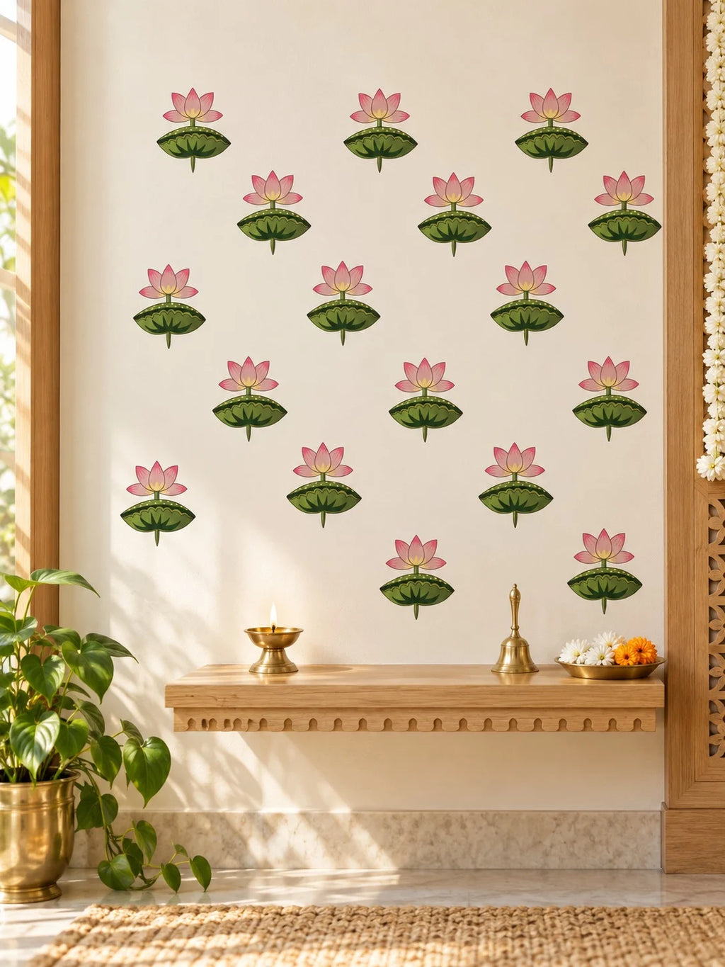 Tipi Tipi Tap Pink Lotus Flower Wall Stickers arranged in rows on a cream-colored wall above a wooden shelf with brass lamps and a plant.