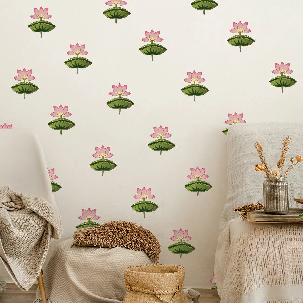 Tipi Tipi Tap Pink Lotus Flower Wall Stickers on a white wall above a styled bed with neutral-toned bedding, a woven throw pillow, and a small vase with dried grasses.