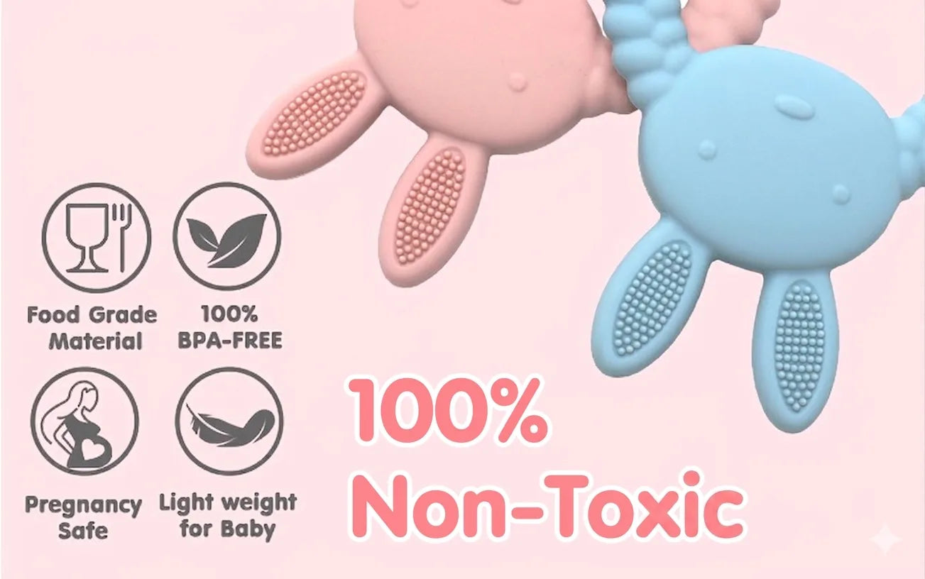 Two Tipi Tipi Tap Rabbit silicone teether toys, one pink and one blue, with safety certification icons and text "100% Non-Toxic" on a pink background.