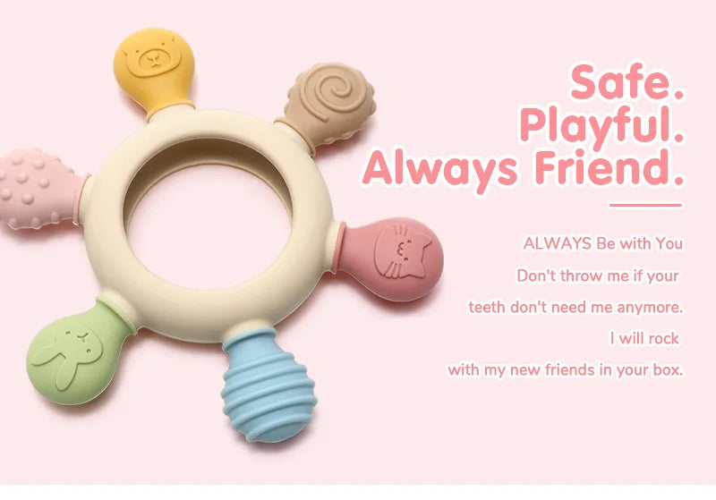 Colorful Tipi Tipi Tap Rainbow Ring Silicone Baby Teether with "Safe, Playful and Always friend" text on a pink background