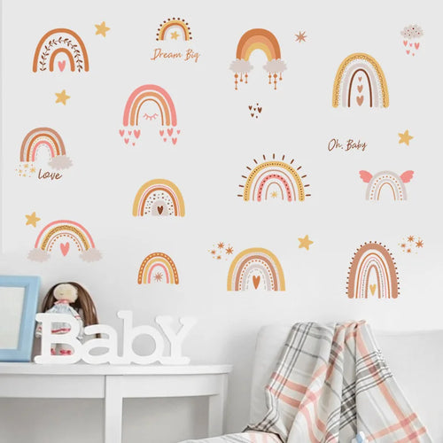Wall with rainbow and cloud decals in a child's room