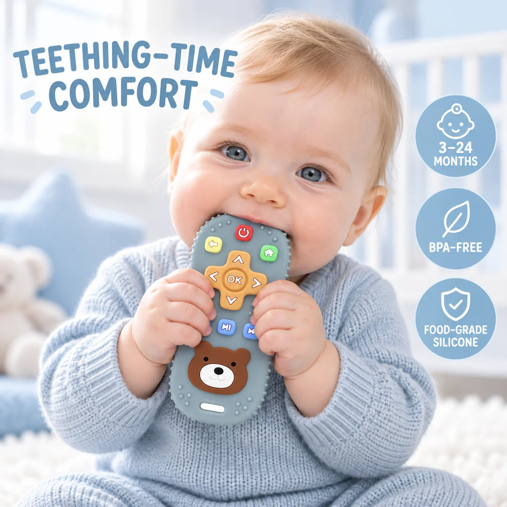 A baby wearing a light blue knit outfit holds a Tipi Tipi Tap Silicone Baby Remote Teether shaped like a remote control with a bear face. The image includes marketing text reading 'TEETHING-TIME COMFORT' and circular badges stating '3-24 MONTHS', 'BPA-FREE', and 'FOOD-GRADE SILICONE'.