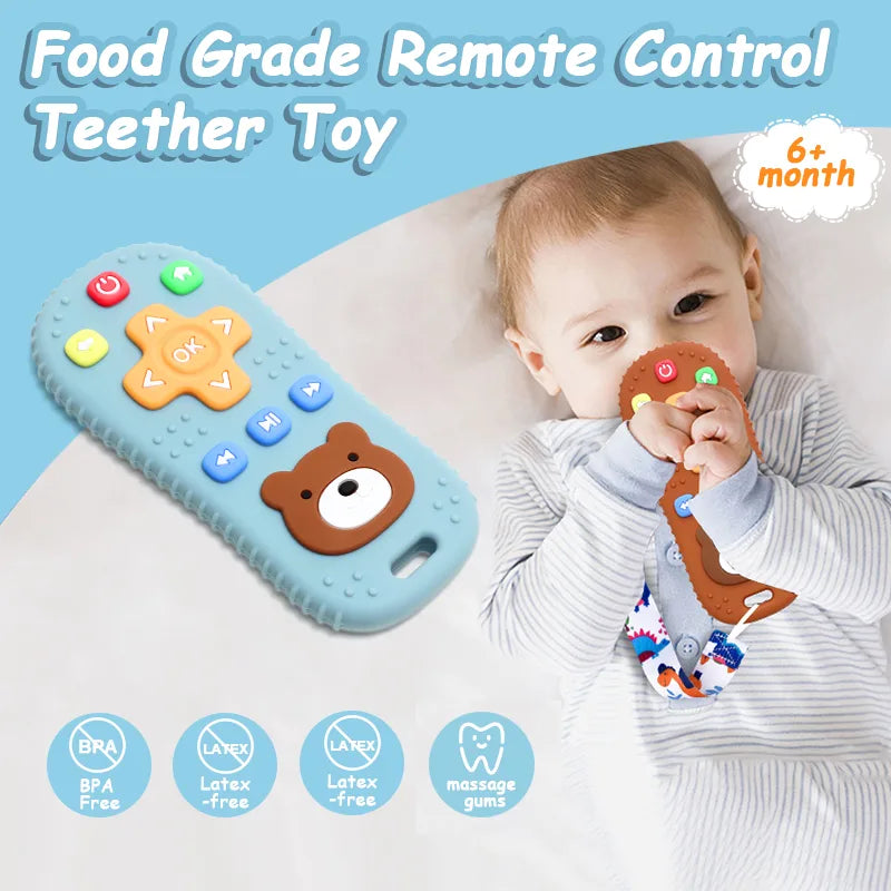 Baby playing with a Tipi Tipi Tap remote control teether toy featuring a bear design.