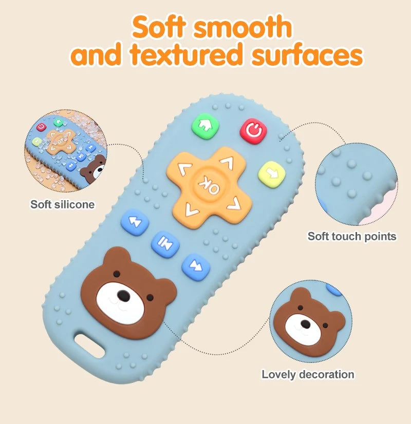 Tipi Tipi Tap remote control teether toy with bear face, soft silicone, and textured points on a beige background.