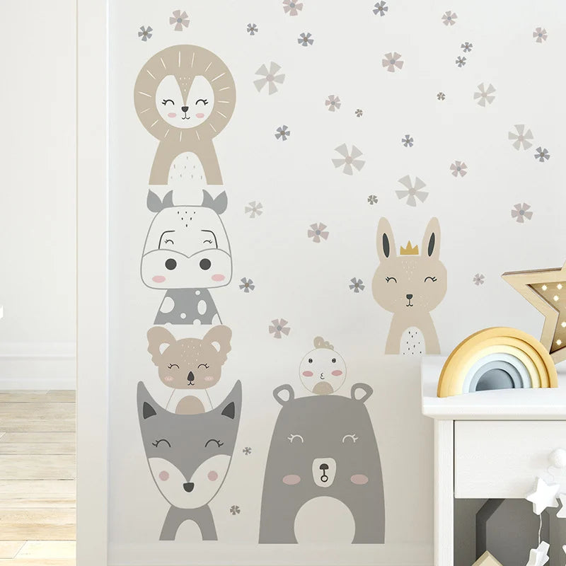 Children's room with Tipi Tipi Tap cartoon animal wall decals on a light gray wall.