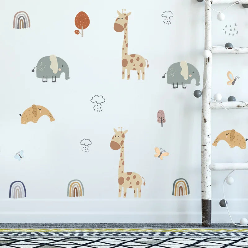 Children's room with animal-themed wall decals on a white wall.