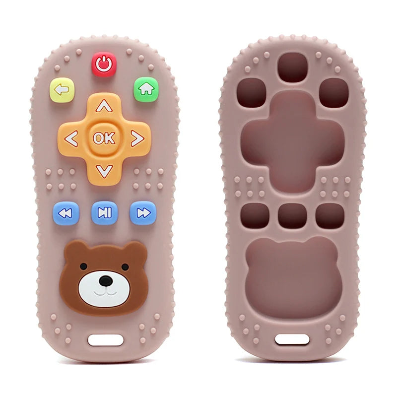 Tipi Tipi Tap Silicone Baby Teether Toy remote control in pink color with bear face design on a white background