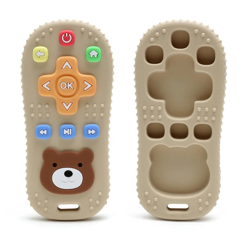 Tipi Tipi Tap Silicone baby remote control teether toy in beige color with bear face design on a white background