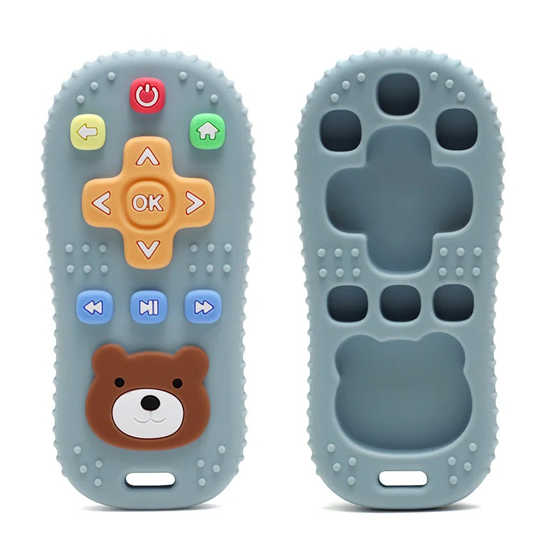 Tipi Tipi Tap Silicone baby remote control teether toy in blue color with bear face design on a white background.