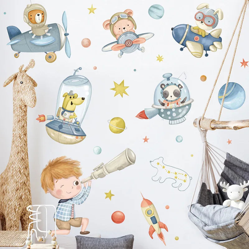 Children's room with Tipi Tipi Tap space-themed wall stickers featuring  animals astronauts, planets, and rockets.