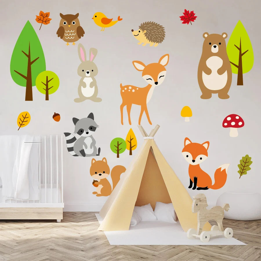Children's room with forest animal wall decals and a wooden teepee.