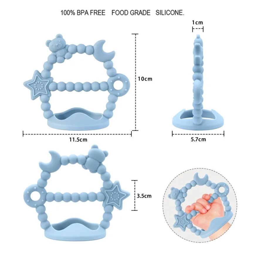 Blue Tipi Tipi Tap Wrist silicone teether with star and circle designs, showing measurements and BPA-free text.