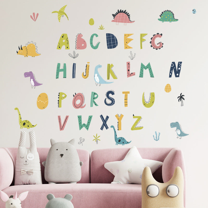 Children's room with Pumkins colorful alphabet and dinosaur wall decals on a light gray wall.